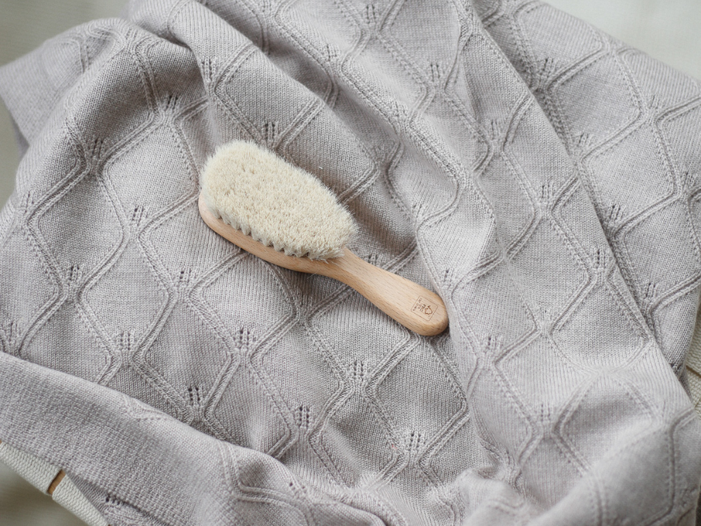 Babydecke mit Rautenmuster in camel melange